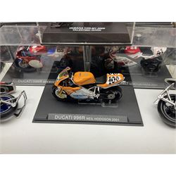 Fifty-one die-cast models of motorcycles by Maisto, Protar Italeri, Welly etc; many in perspex display boxes, some in window boxes and some unboxed