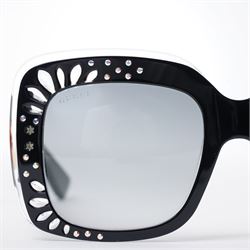 Gucci - pair of oversized black acetate sunglasses, the square frames with studded and crystal embellishment to the front and signature green and red web temples with interlocking gold-tone GG logo and bee motif, unused with original velvet pouch and box