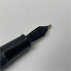 Four fountain pens, each with 14ct gold nibs, comprising Mentmore Paramount, Parker Junior Duofold, Conway Stewart marbleised pen and Waterman's, together with a 14ct gold Conway Stewart 5B nib