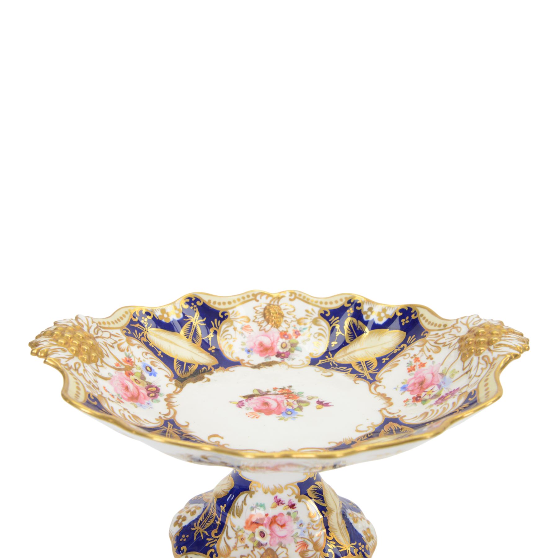 Collection of 19th century porcelain dessert wares, comprising Bloor Derby dish, circa 1825, Spode Felspar shaped oval dish, circa 1820, Ridgeway shaped oval footed dish with twin handles, circa 1840, Ridgeway dish, circa 1820, and tazza and dish, probably Minton, pattern 4810, each decorated in various patterns with floral sprays against dark blue grounds and heightened with gilt