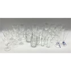 Drinking glasses, including a pair of Wedgewood flued glasses, a set of six fluted glasses with frosted floral decoration, a selection of moulded wine glasses, etc. 