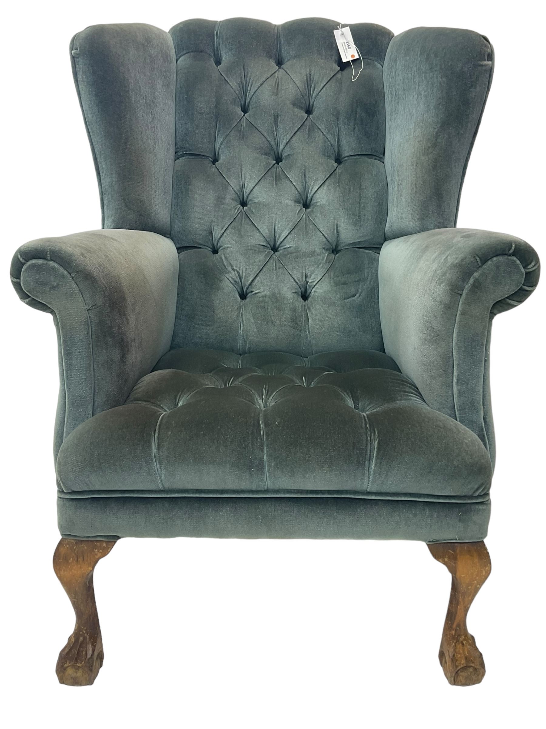 Georgian design wingback armchair, traditional shape with rolled arms, upholstered in teal velvet fabric, on cabriole supports with ball and claw feet