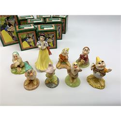 Royal Doulton Snow White and the Seven Dwarfs figurines, each with box. (8). 