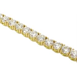 18ct gold round brilliant cut diamond line bracelet, stamped 750 with London city mark, total diamond weight approx 7.70 carat