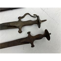 Late 19th/early 20th century Indian Tulwar sword with 81cm plain curving steel blade and iron hilt with extended langets, knucklebow and spiked pommel; in leather covered scabbard L100cm overall; and another Tulwar lacking scabbard in almost relic condition (2)