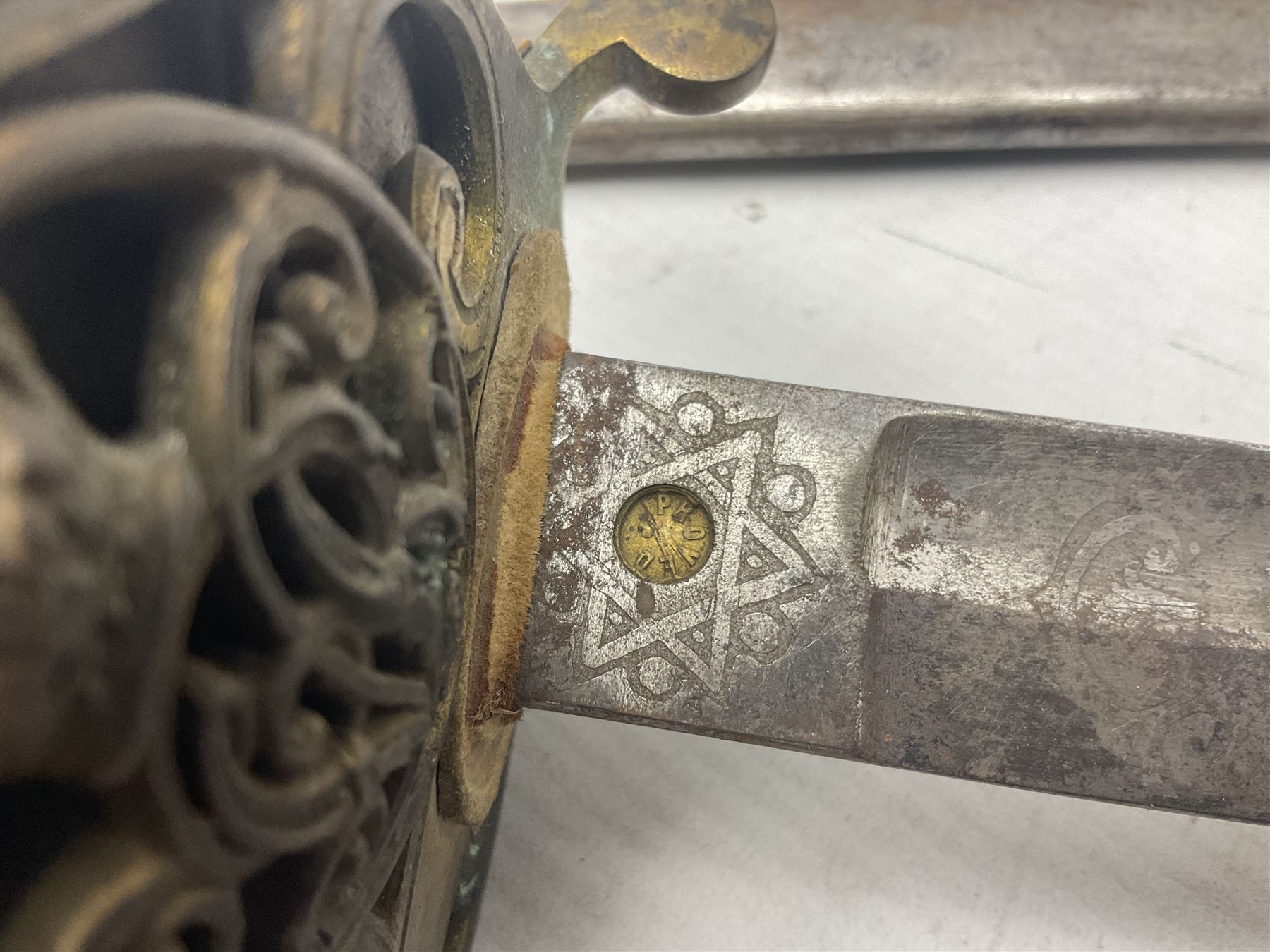 Victorian British Army officer's sword by Hobson & Sons Little Windmill Street London, the 82cm fullered steel blade etched with crowned Victoria cypher and 'HM 1st West York R.V.', lined gilded brass three-bar hilt incorporating Victoria cypher and wire-bound fish skin grip with plaited knot; in steel scabbard with two hanging rings L99cm overall