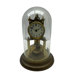 An unmarked late 19th century 400-day torsion clock under a glass dome, with a solid rotary pendulum, cream dial with Arabic numerals and steel spade hands with a beaded bezel mounted on a circular brass base with two pillars.
With a 20th century French three glass Bayard carriage clock, 8-day movement with a lever platform escapement wound and set from the rear with integral key, white painted dial with roman numerals and minute markers, steel spade hands.




