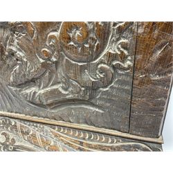 19th century Continental carved oak panel, of square form with curved upper corners, carved with the profile of a male figure facing dexter, upon a tapering base with stylised carved decoration, H51cm W54.5cm
