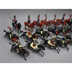  Twenty-four soldiers on horseback by Britains etc, some with articulated arms  