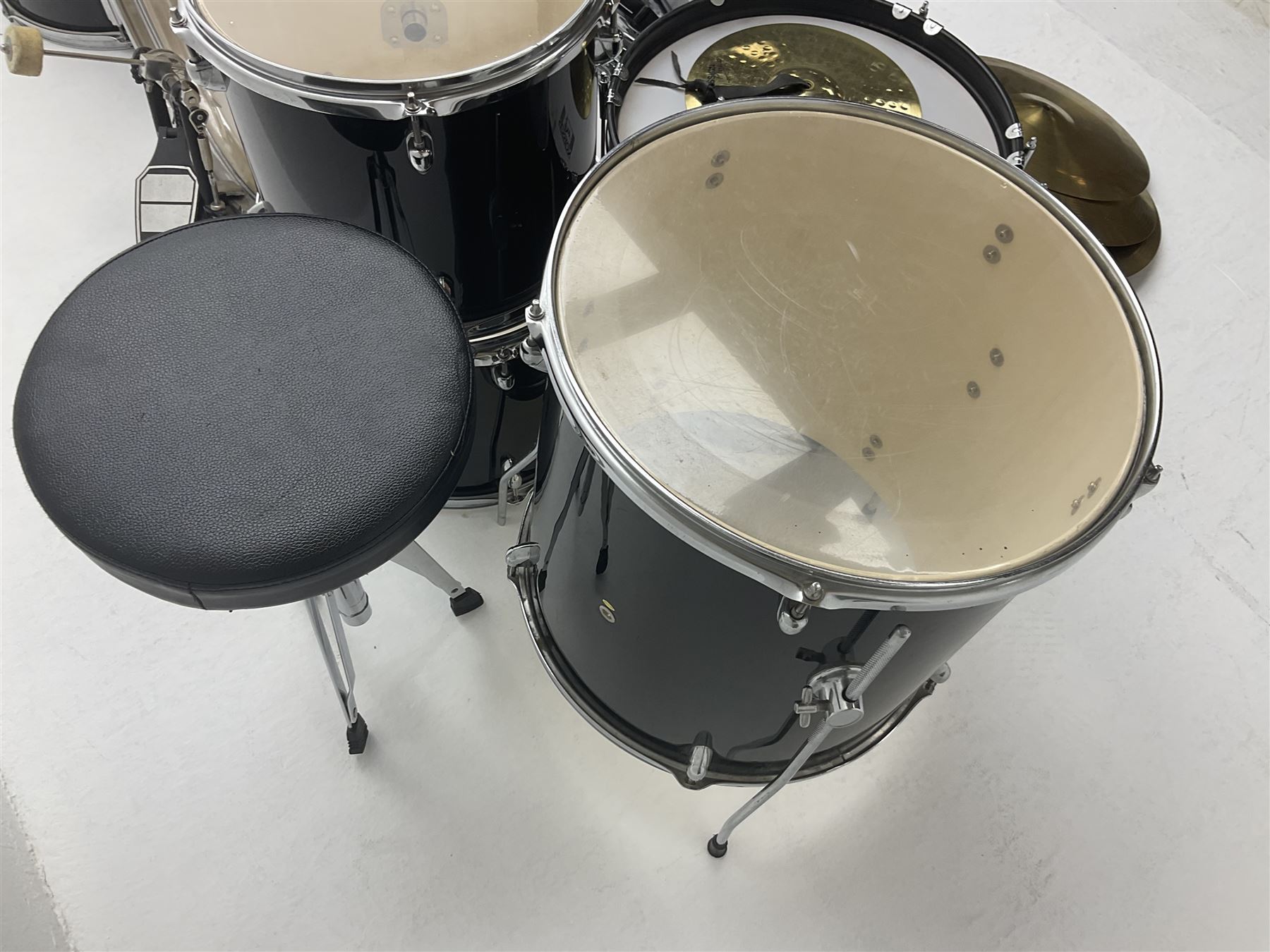 Rockburn eight-piece black drum kit with bass drum, floor tom and five other toms and snare drum; together with two other snare drums; Haosen bass drum; four cymbals; various stands, foot pedals, stool, tri-angle, drum sticks etc