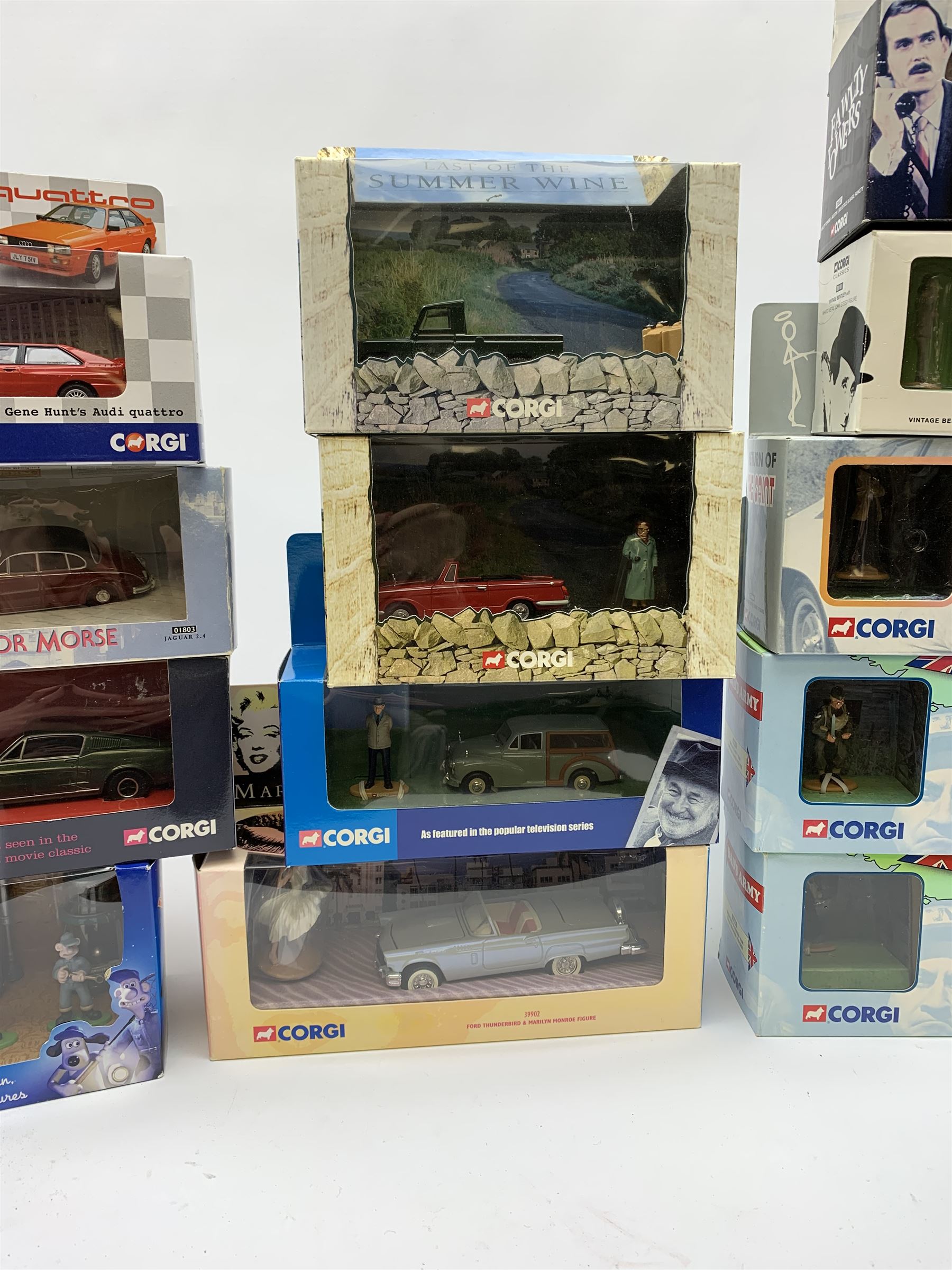 Eighteen Corgi die-cast models of TV & film interest including Dad's Army (2), Last of the Summer Wine (2), Heartbeat (2), Blues Brothers, Bullitt, Marilyn Monroe, Return of the Saint, Thunderbirds FAB1, The Avengers etc; all mint and boxed (18)