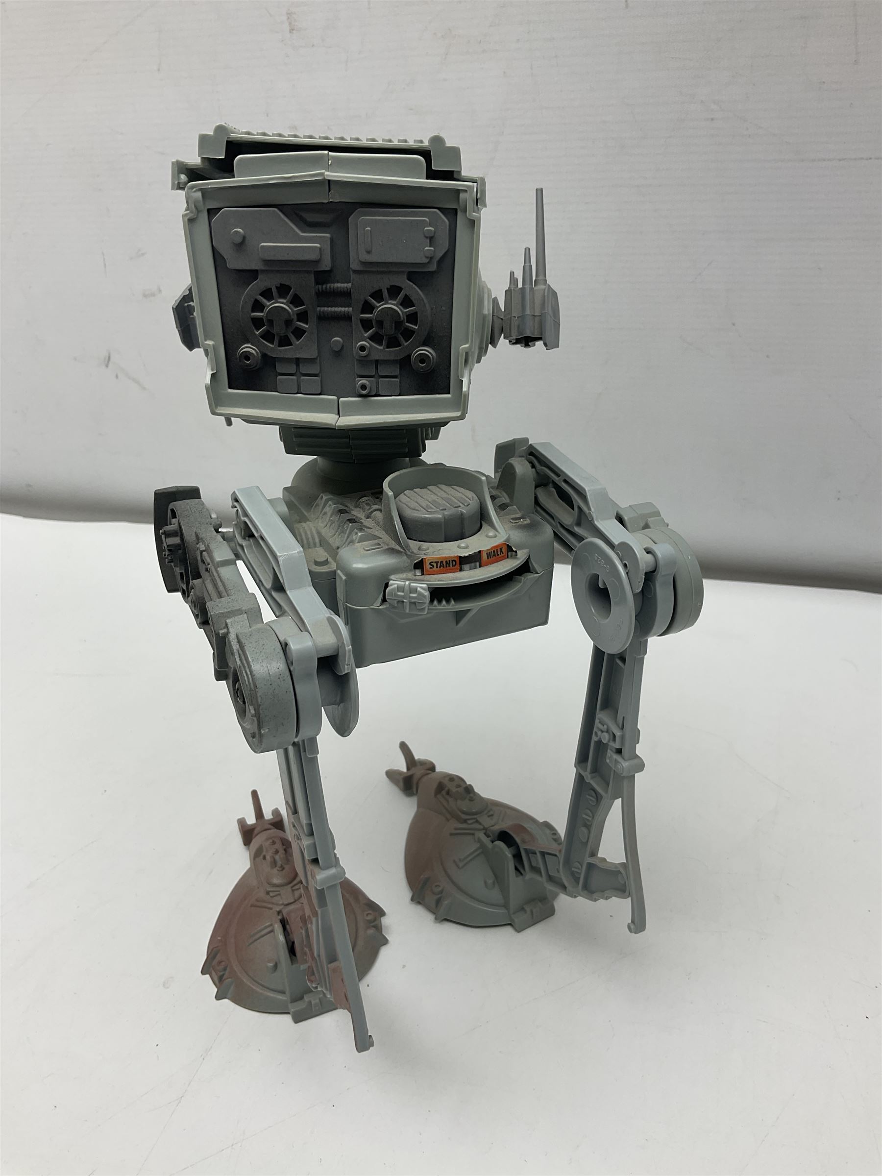 Star Wars - four space/land vehicles comprising Millenium Falcon with hinged top and figures; TIE Fighter; X-Wing Fighter with pilot; and AT-ST 'Chicken Walker' transporter; all unboxed (4)