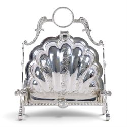 Silver-plated Victorian style biscuit box, in a shell form with engraved leaf detailing, u...