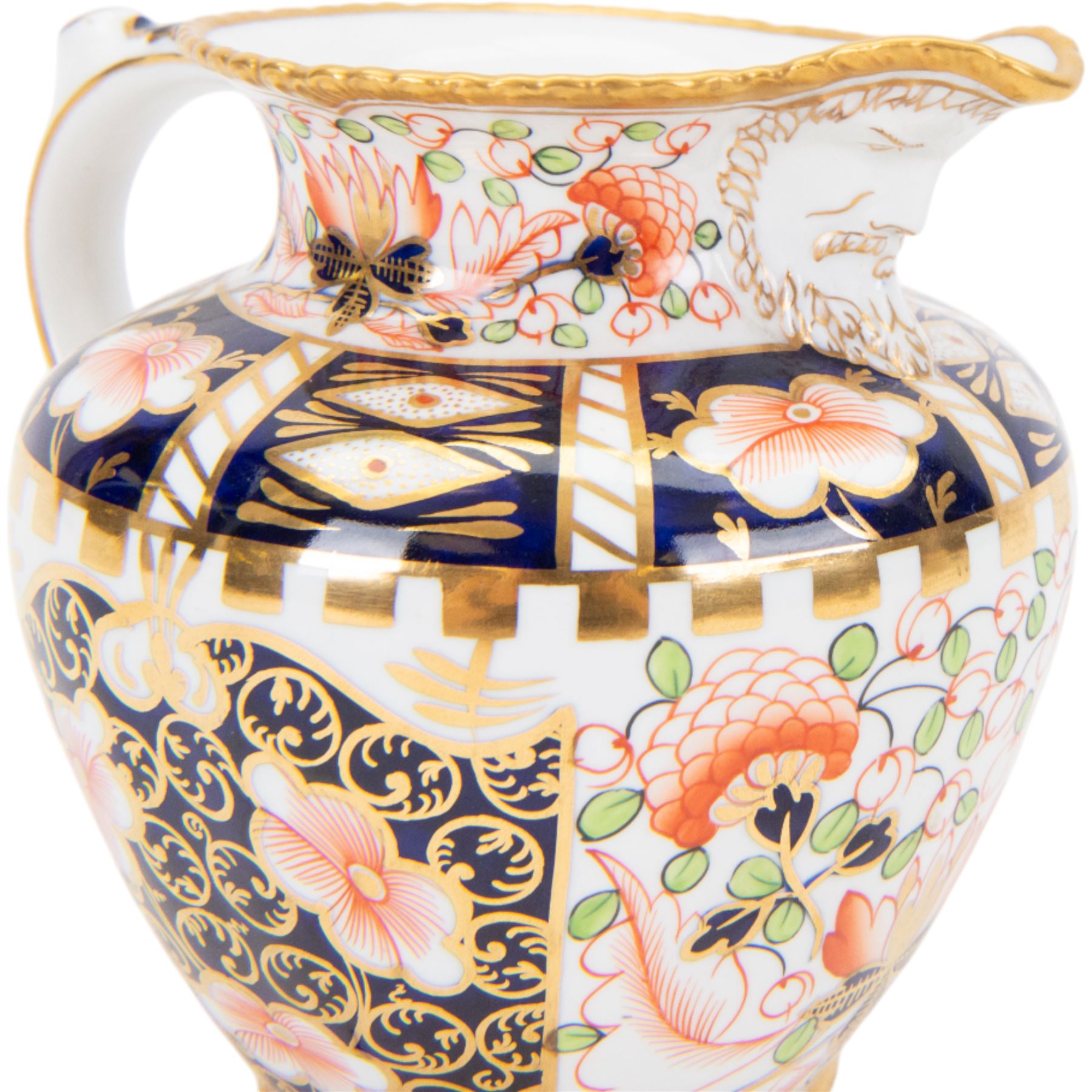 Royal Crown Derby Witches pattern jug, circa 1920s, with mask lip and gold rim, H15cm
