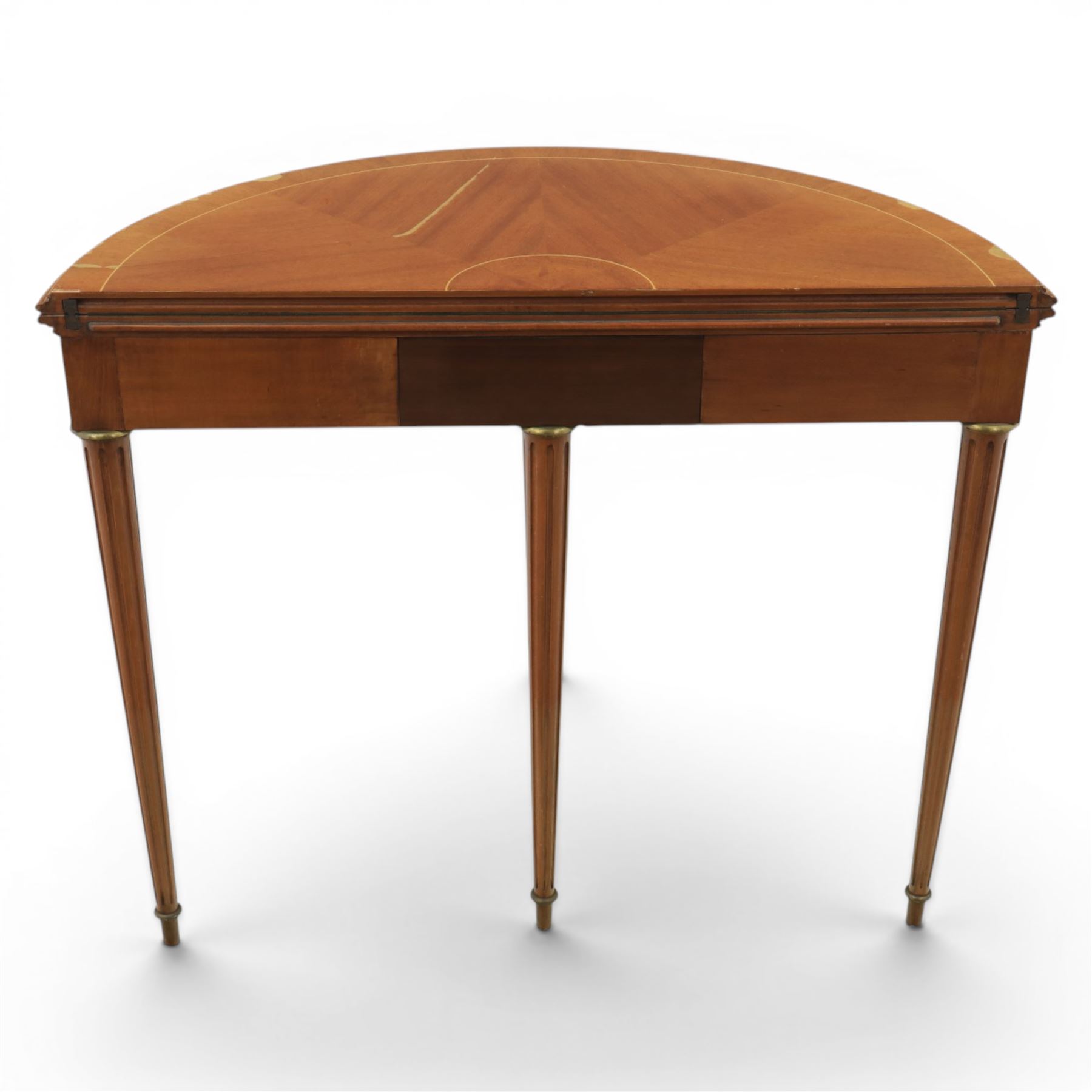 Regency revival mid 20th century walnut card table, demi lune form inlaid with boxwood, kingwood frieze with brass detail fold-over top with retractable back leg, revealing circular leather playing surface, circular tapering legs
