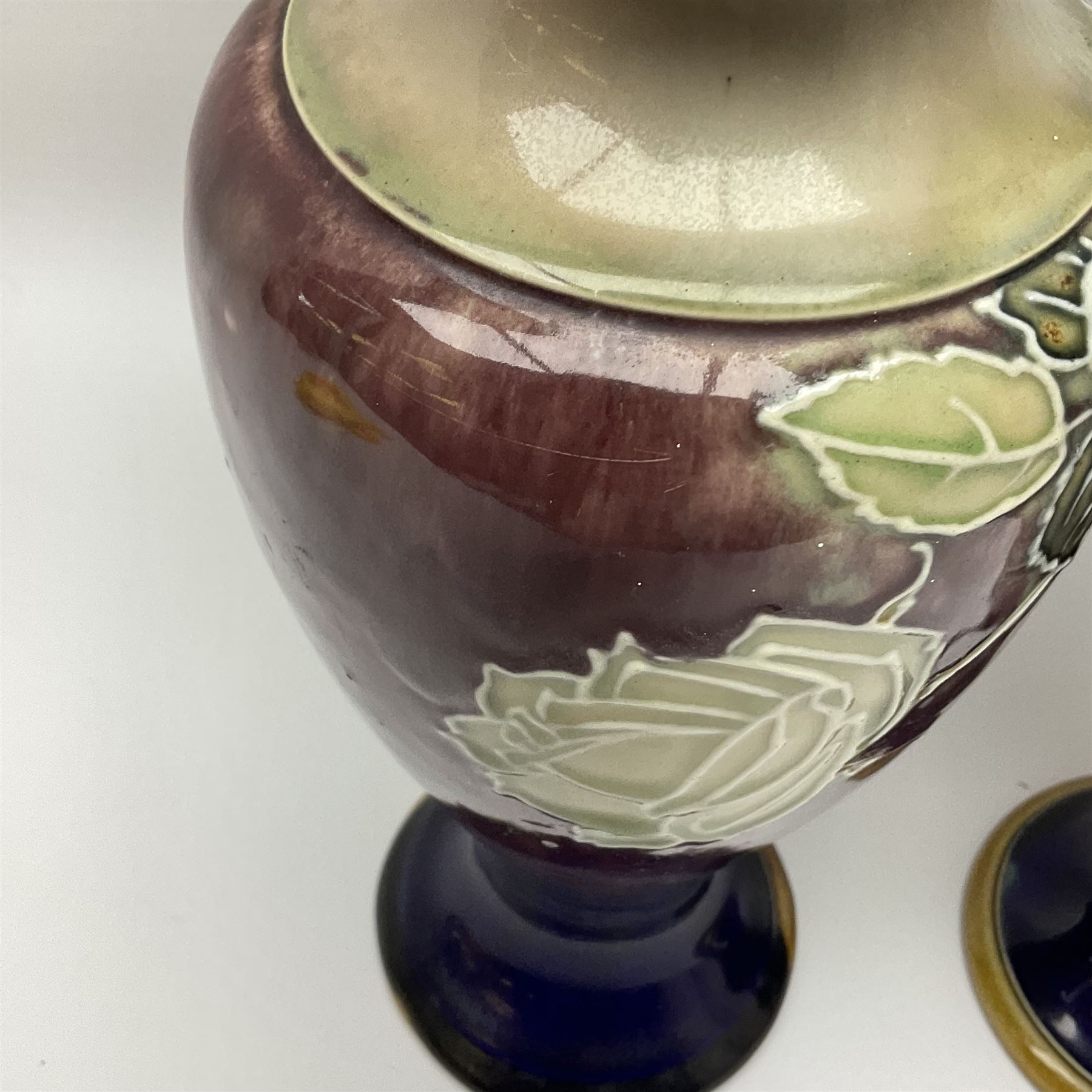 A pair of early 20th century Royal Doulton stoneware vases, of baluster