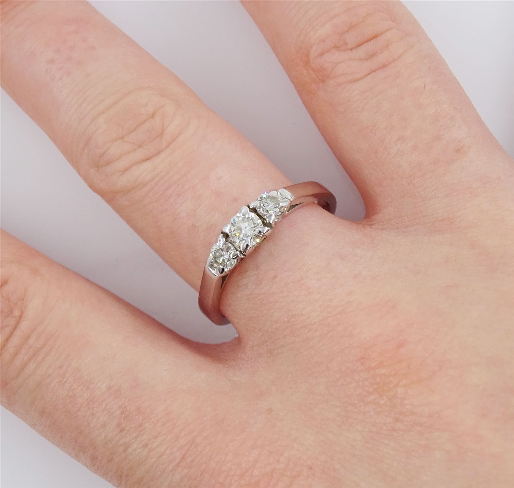 18ct white gold three stone round brilliant cut diamond ring, hallmarked, total diamond weight approx 0.50 carat