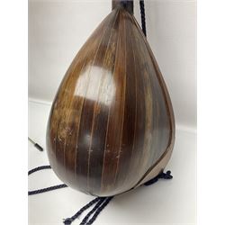 Late 19th/early 20th century Italian lute back mandolin with segmented back and spruce top; bears maker's label for Pietro Tonelli Napoli; together with a mandolin instruction booklet and a folding music stand L60.5cm