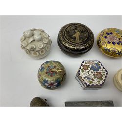 Group of snuff and other boxes of various form, to include a number of Oriental examples, including black papier-mâché box decorated in gilt with figure before a fence, Cloisonné example modelled in the form of an apple with pendant suspended from the stalk stamped 14, three other Cloisonné examples two Chinese Canton ivory examples, base metal matchbox holder decorated with birds, etc. 