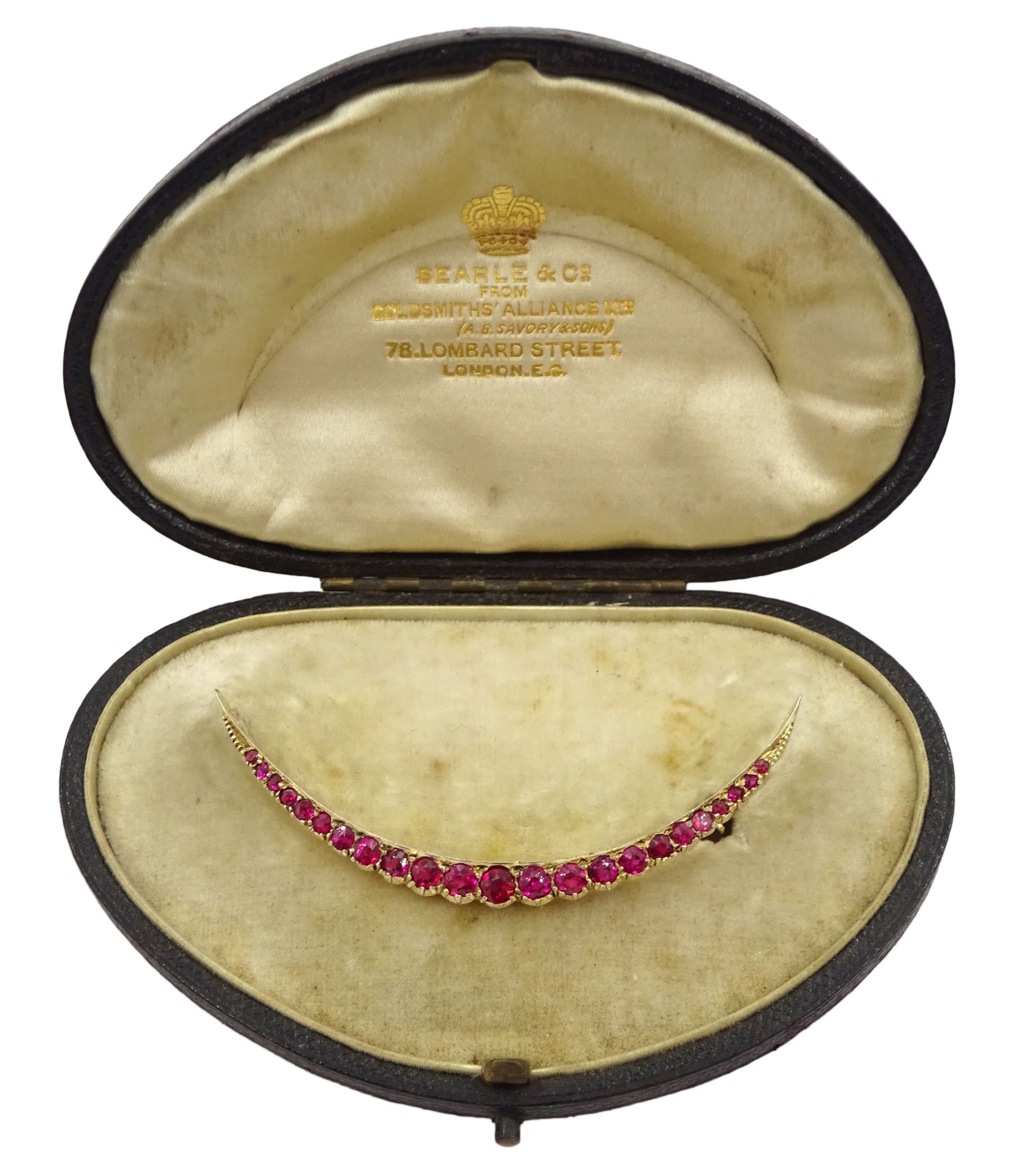 Early 20th century 9ct gold synthetic ruby crescent brooch, in fitted silk and velvet lined box by Searle & Co, London