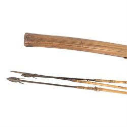 South American Indian carrying bag for blow pipe darts, together with African quiver with three barbed arrows