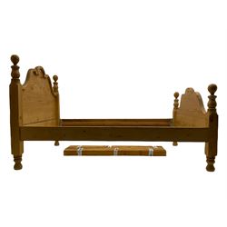 Waxed pine double 4' 6'' bedstead, shaped head and footboards with applied moulding