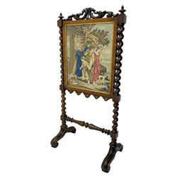 Victorian rosewood fire screen, scrolled foliage carved pediment, rectangular frame with moulded gilt slip enclosing figural needlework tapestry panel, on spiral turned supports with finials united by turned lower stretcher, on out-splayed feet with scroll carved terminals 