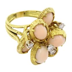 Gold pink coral and diamond cluster ring, eight split pin cabochon corals with four round brilliant cut diamonds in a stepped design setting, stamped 18K