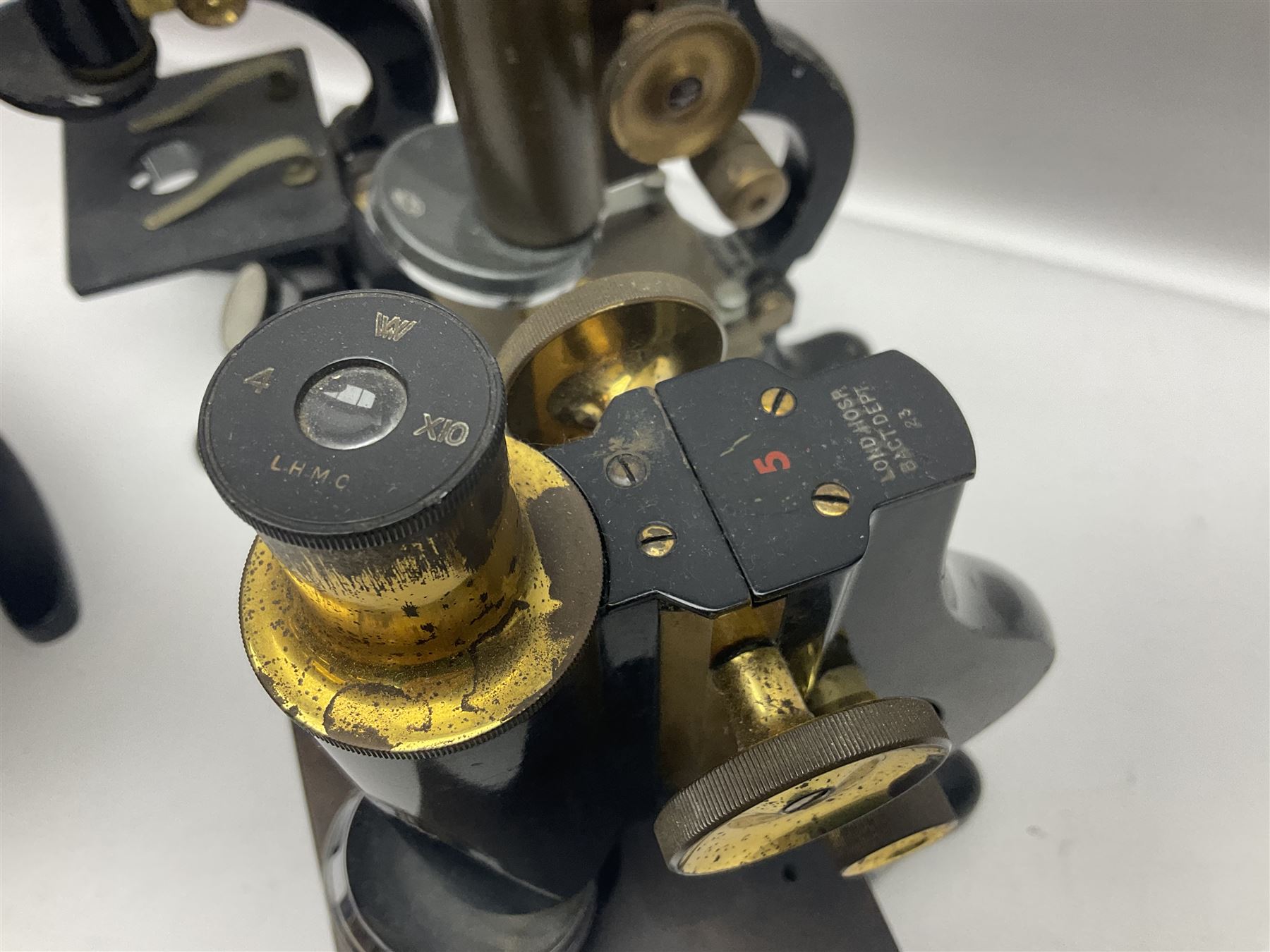 Four microscope, comprising W.J George Ltd, Watson Service 716606, Meopta no 230087 and one other  