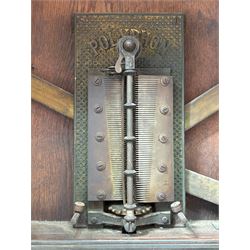 Victorian Penny-in-the-slot Polyphone, the walnut case with arched pediment and applied cartouche above pierced fretwork spandrels, glazed door above drawer to base, retailers label to each side reading 'H.Peters & Co. London Made in Leipzig' enclosing a fully working mechanism complete with 11 disks (50cm diameter) and winding handle.   - COLLECTION BY APPOINTMENT FROM: The White House, Thirsk Road, Easingwold, York, YO61 3NF - CALL 01723 507111 TO ARRANGE