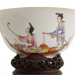 Chinese porcelain famille rose bowl, depicting female figures in a boat, one female seated offering a Lingzhi and a seated female holding out a Ruyi sceptre, against a Anhua ground, the interior with turquoise glaze, red Jiaqing (1796-1820) seal mark beneath, on hardwood stand, D17cm 