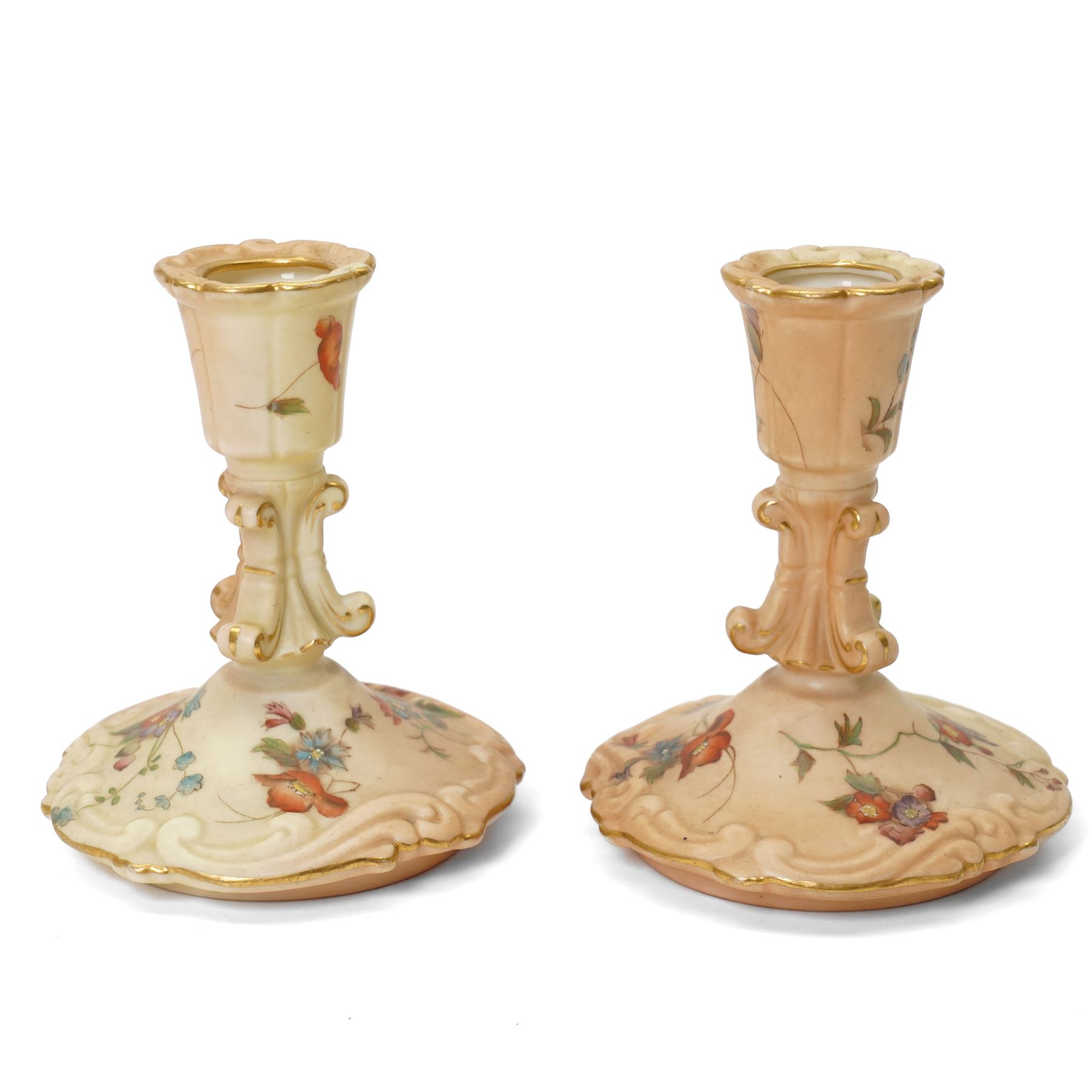 Collection of Worcester blush ivory, including a pot pourri and a pair of candlesticks by George Grainger & Co, with brown and green stamps to bases, together with a teacup and saucer with marks in puce, candlesticks H12cm 