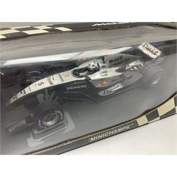 Three Minichamps 1:18 scale die-cast McLaren racing cars - Mercedes MP4-19 D. Coulthard; Mercedes MP4-20 K. Raikkonen; and Vodaphone Mercedes MP4-22 L. Hamilton 2007; all boxed (3)


