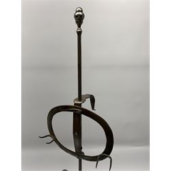 Early 19th century steel lark spit, circa 1800-1820, with rise and fall action panel with six prongs, upon tripod legs, H81cm