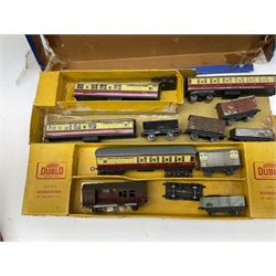 Hornby Dublo eEDP22 box, containing various carriages and wagons, quantity of other Dublo and 'oo' Gauge rolling stock, boxed footbridge, etc., together with various unboxed and play worn Die Cast models, Chinese robot, microscope, boxed Meccano, etc. 
