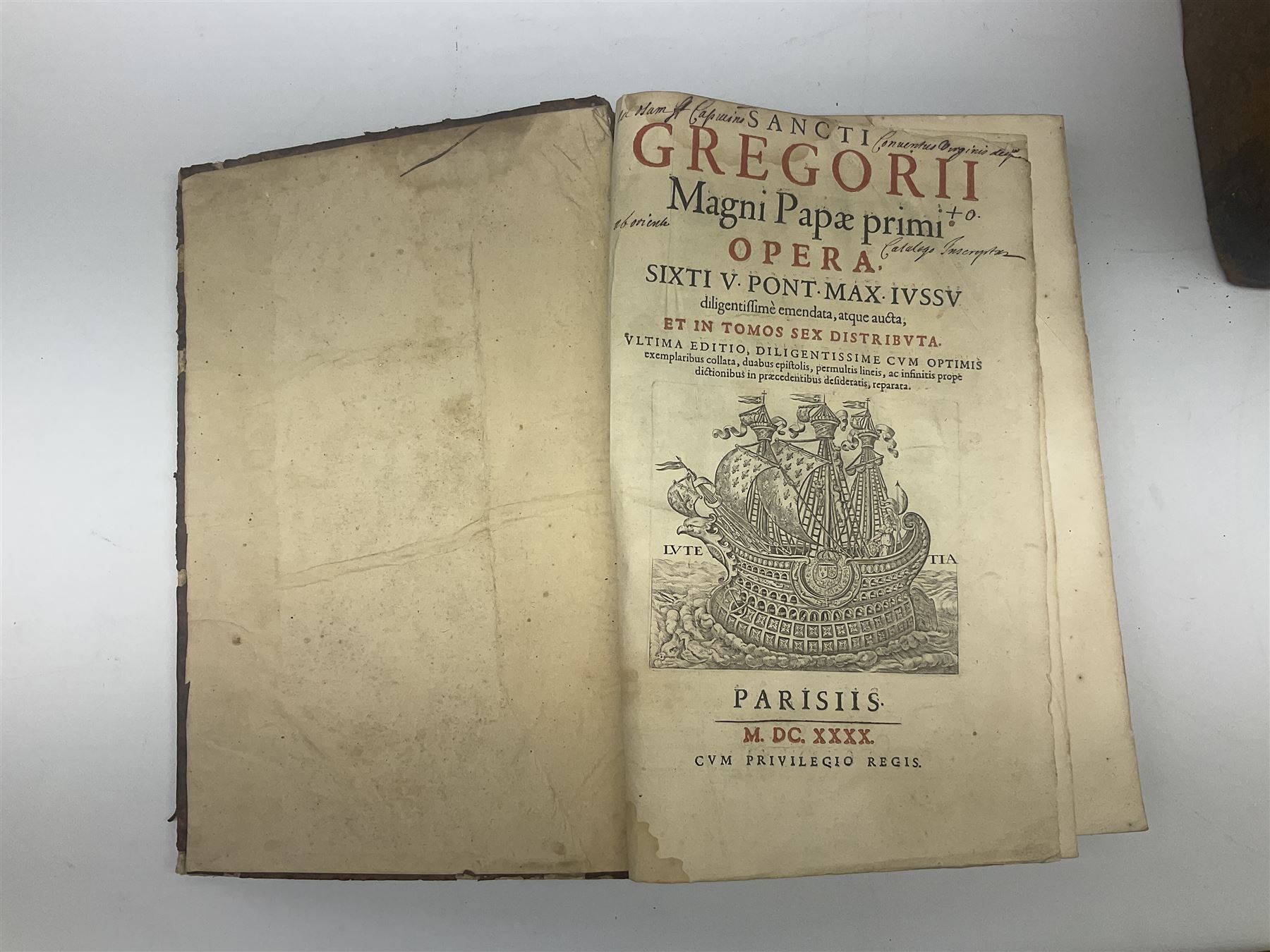 Sancti Gregorii Magni Papae Primi Opera , Sixti V Pont Max Iussu .... 1640 Paris. Two volumes in one with engraved galleon to each title page; R.P. Joan. Stephani Menochij Doctoris Theologi E Societate Jesu .... Editio Novissima .... Tomus Primus. 1683 Lugduni Francisci Comba; and two other similar leather bound folio volumes lacking title pages (4)