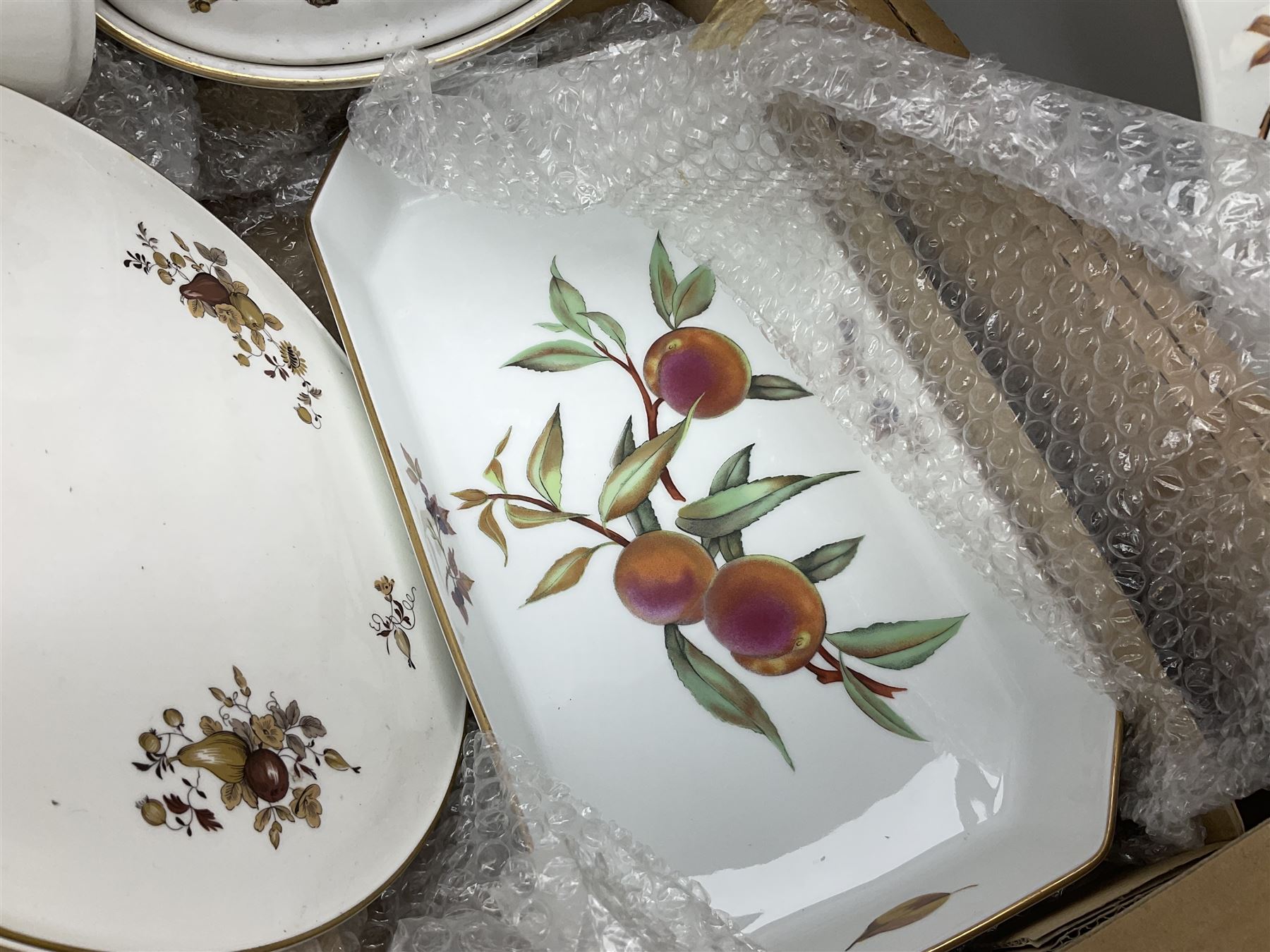 Royal Worcester Evesham pattern dinner wares, to include covered tureens, open dishes, sauce boat, cake stand etc, in two boxes 