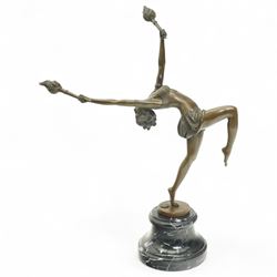 Art deco style bronze figure of a female dancing with flame torches, raised upon marble base, indistinctly signed, H43cm 