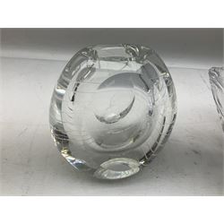 Two Orrefors Art Glass clear glass vases, the first example of compressed circular form, the second of tapering form with lobed rim, each signed beneath, tallest H14.5cm