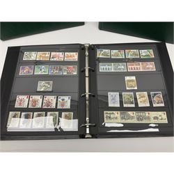 Mostly Queen Elizabeth II Great Britain and Isle of Man stamps including mint examples, housed in various albums, stockbooks and loose, in one box