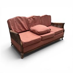Early 20th century French style bergère conservatory suite, canework back and sides with red upholstered loose seat cushions, on cabriole feet