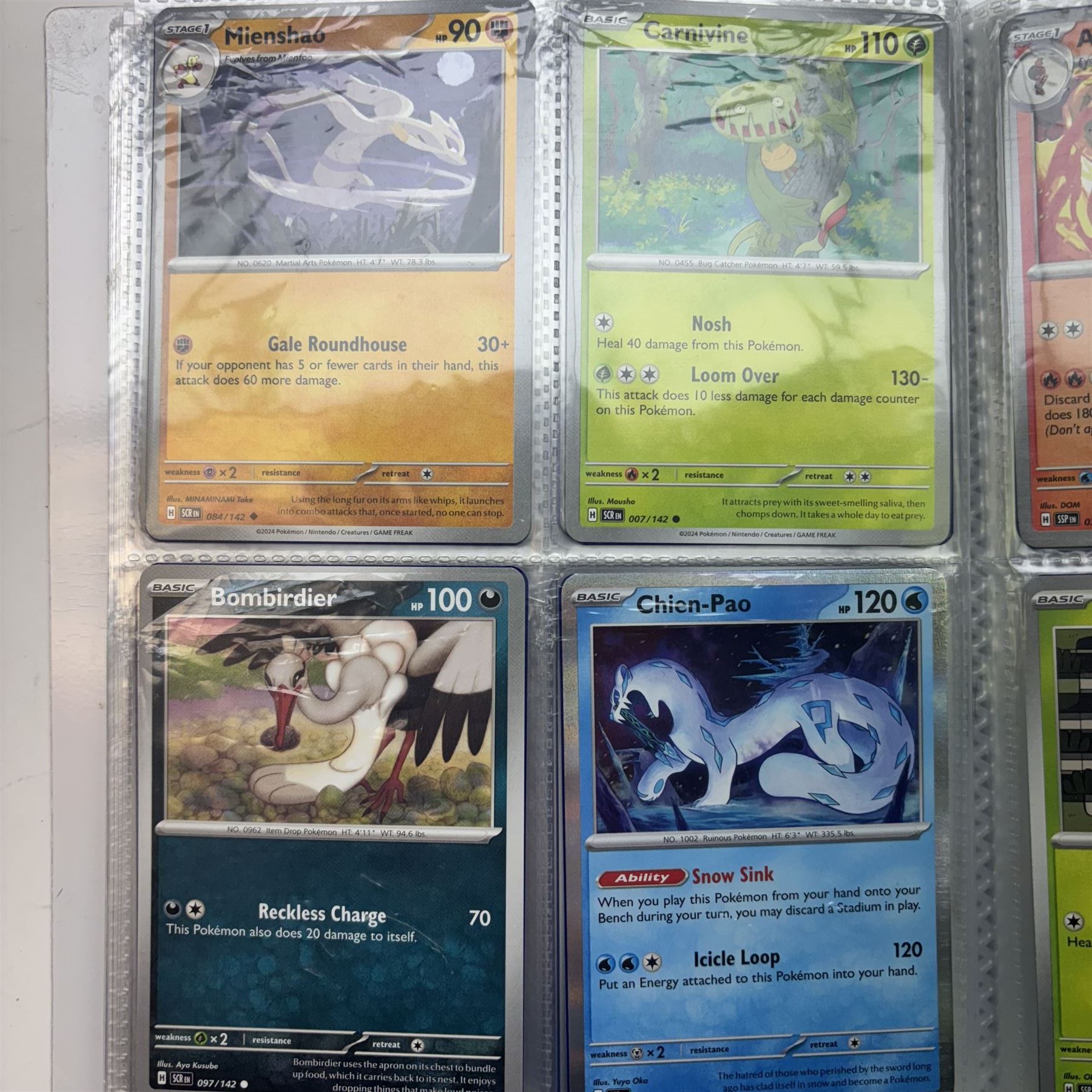 Collection of modern Pokemon TCG trading cards from the Scarlet & Violet and Sword & Shield eras, contained within in two folders, opened packets and loose, together with a graded Sword & Shield Silver Tempest Passiman TG08, GET Graded 9 Mint, two oversized cards, energy cards, vintage booklets and boxes, empty tins, 1998 Electronic Pokédex and other accessories