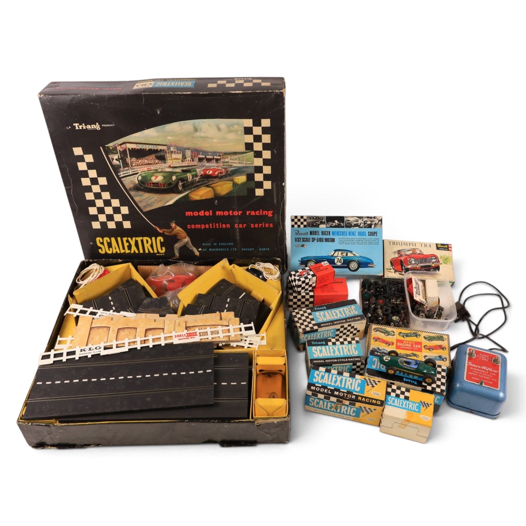 Tri-ang Scalextric Model Motor Racing set C.M.3, with five Tri-ang Scalextric slot car models, including Lotus 1961 in blue, Lotus 1961 in green, Typhoon motorbike and sidecar, B12 Hurricane motorbike and sidecar and Aston Martin DB4 GT,  all boxed, together with Merit Racing Car Assembly Kit, kit built Revell Model Racer Mercedes Benz 300SL Coupe, part built Revell Triumph TR4, Indi-Novi-Ferguson slot car and other accessories 