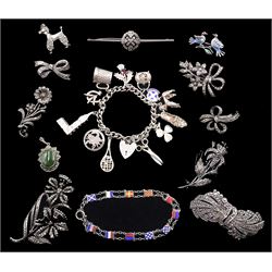 Silver jewellery including charm bracelet, enamel flag bracelet, enamel lovebird brooch, nine marcasite brooches and a marcasite and agate pendant 