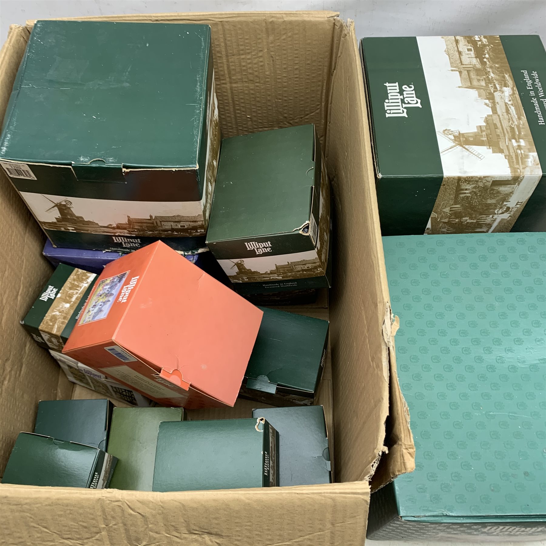 A group of sixteen boxed Lilliput Lane cottages, comprising Pastures New, Full Steam, The Old Mill at Dunster, Frosty Morning, The Great Equatorial Millennium Special Edition, Hickory Dickory Dock, Frost Bite, Make a Wish, Open all Hours, Catch a Cold, The Crooked House, Dunster Yarn Market,  Mother of Pearl, Appleby East, Rock-a-bye-Baby, and Ice to Meet You.