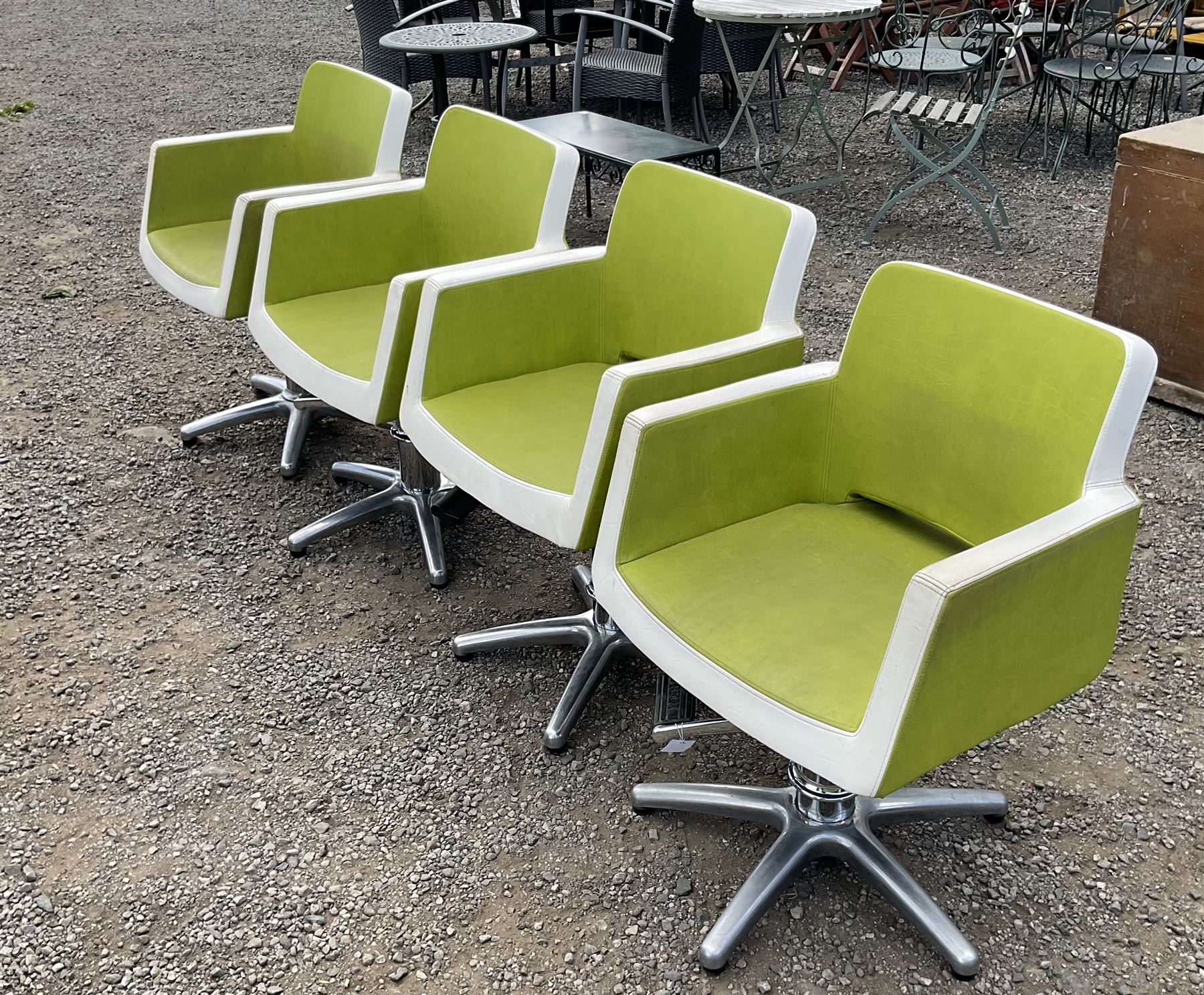 Salon Equipment - Set of four green and white faux leather hydraulic styling salon chairs - THIS LOT IS TO BE COLLECTED BY APPOINTMENT FROM DUGGLEBY STORAGE, GREAT HILL, EASTFIELD, SCARBOROUGH, YO11 3TX