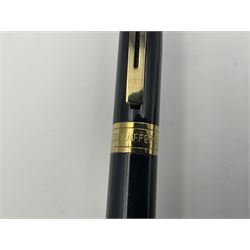 Sheaffer Legacy fountain pen, the black barrel with gold plated trim and palladium cap and gold nib stamped 18K 750, together with matching roller ball pen, Sheaffer fountain pen with black barrel and gold nib stamped 14K 585, Sheaffer 300 fountain pen with black barrel and bi-colour nib, and Sheaffer ballpoint pen with black barrel, largest L15cm (5)
