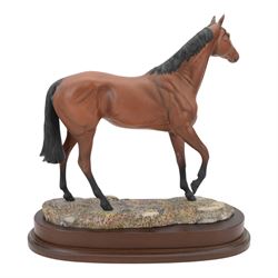 Two Royal Doulton horses, Desert Orchid and Red Rum, on wooden plinths 
