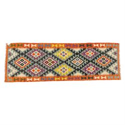 Chobi flatweave kilim runner with a repeating stepped diamond medallion design in live gre...