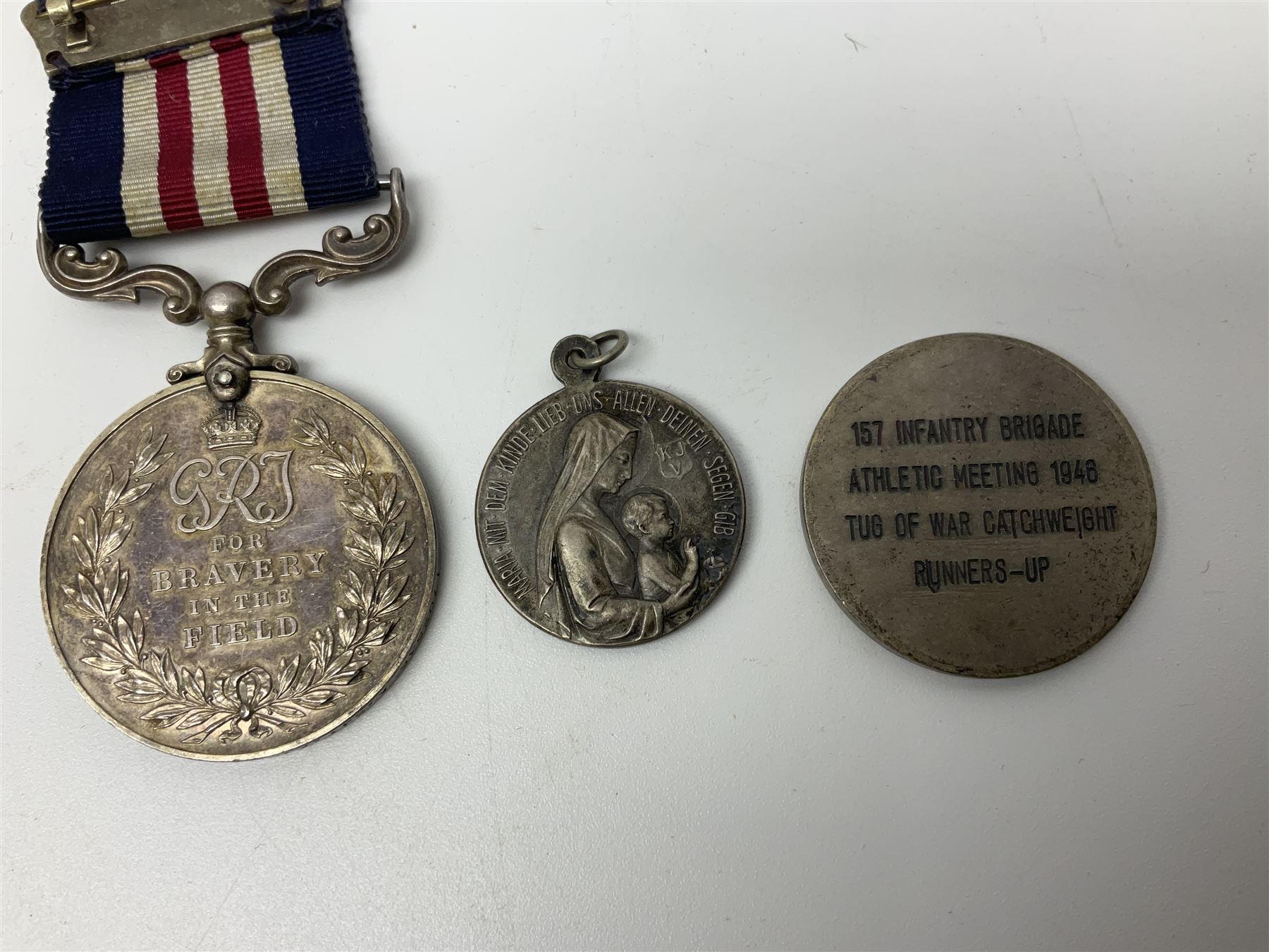 WW2 Highland Light Infantry Military Medal group of five comprising MM, 1939-1945 War Medal, Defence Medal, 1939-1945 Star and France and Germany Star; three with ribbons; awarded to 1702538 A. Sjt. A.L. Alden H.L.I.; various copies of his citation giving details of his bravery on 26 Sep 44 at Donderdonk France when he single-handedly silenced an enemy machine gun nest. The citation also mentions a further heroic act on 15 Nov 44 when he risked his life to obtain vital information on the position of enemy mines and booby traps saving the lives of many other soldiers; the collection also comes with two contemporary group photographs of his Highland Light Infantry regiment, copy photograph of him being awarded the MM by Field-Marshall Montgomery, two post-war tug-o-war medallions and other items; together with a shooting medallion awarded to Gnr. J. Alden (his brother John) inscribed 123 L.A.A. Regt. R.A. Rifle Meeting Harburg 1945 and a Life Saving bronze medallion to J. Alden April 1938
